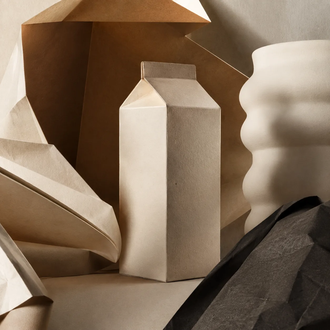 Unlabelled packaging among tactile folded paper forms